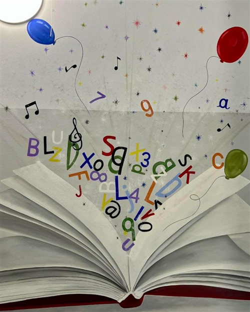 Un ingresso che racconta la scuola: arte, colori e futuro alla Primaria di Tarantasca